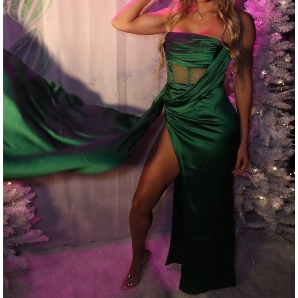 Unique green gown with embellishments and leg slit